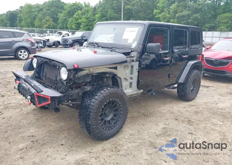 2008 Jeep Wrangler Unlimited Sahara из США, поврежденный, VIN 1J4GA59128L504798